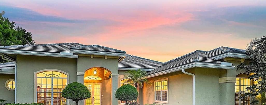 Waterfront home at sunset, 18974 SE Jupiter River Drive, Jupiter